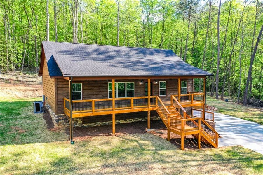 Exterior details and patio area of a home in , Ellijay (Image 20).
