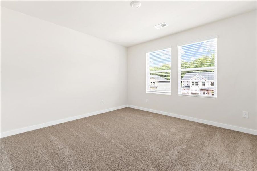 Spacious, unfurnished interior of a new home in Fern Dale, Fairburn (Image 15).