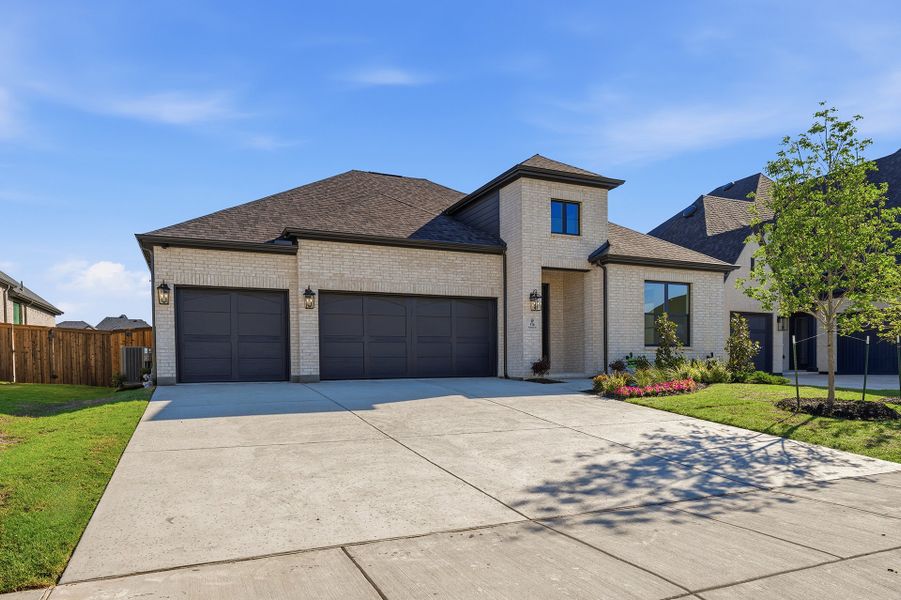 Front exterior of a new home in Quail Hollow, Rockwall, TX, highlighting curb appeal (Image 22).