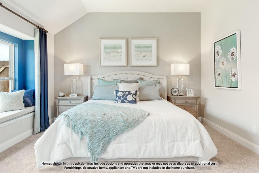 Bedroom with vaulted ceiling, upholstered headboard, window seat, and blue and white bedding
