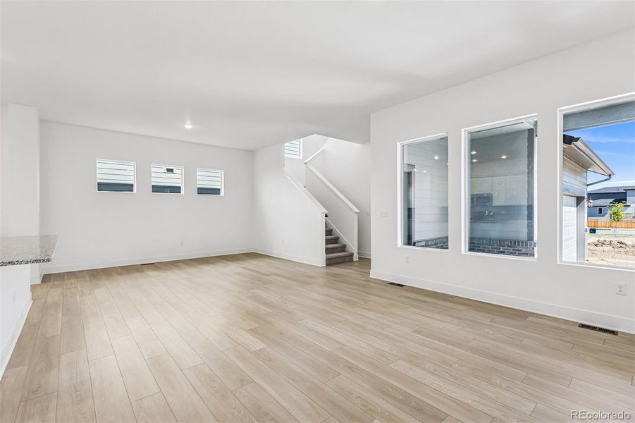 Spacious, unfurnished interior of a new home in Painted Prairie Cottage, Aurora (Image 18).