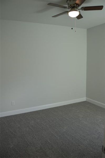 bedroom with carpet and ceiling fan