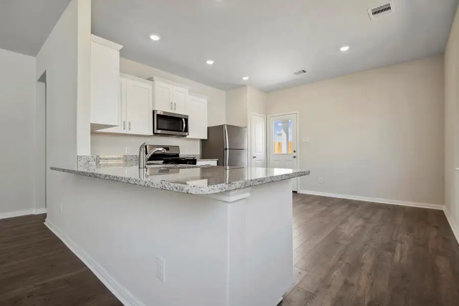 Furnished interior view inside a new home in Sweetwater Ridge, Conroe (Image 7).
