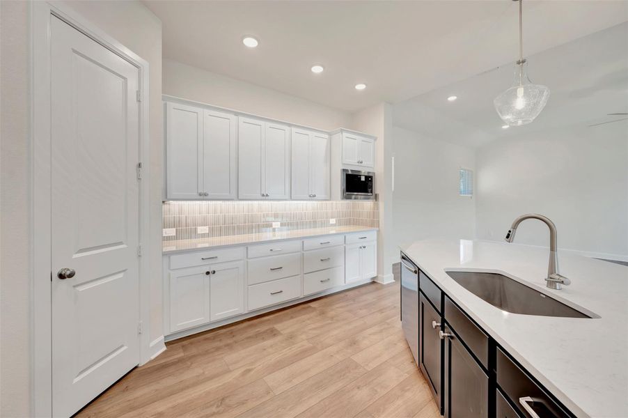 Furnished interior view inside a new home in Riceland - Enclave Row Collection, Mont Belvieu (Image 7).