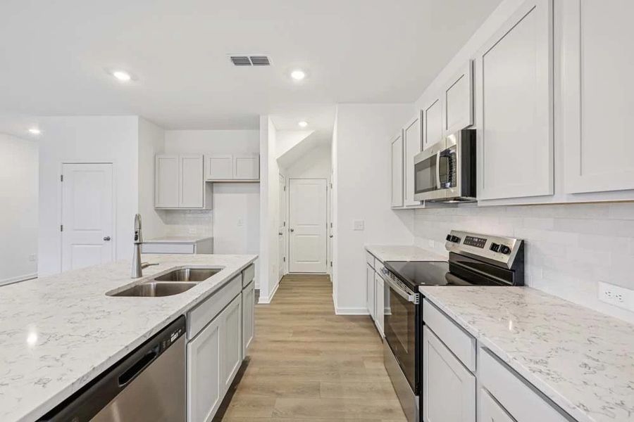 Kitchen featuring Milan Collection Finishes