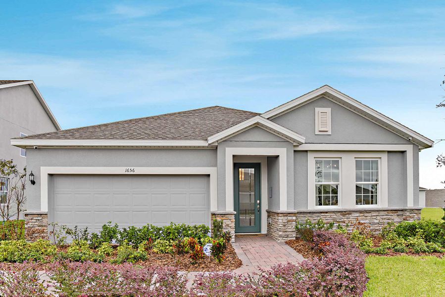 Representative exterior photo of a completed home built from the Kensington Flex by Risewell Homes in Park View at the Hills, Minneola, FL (Image 23).