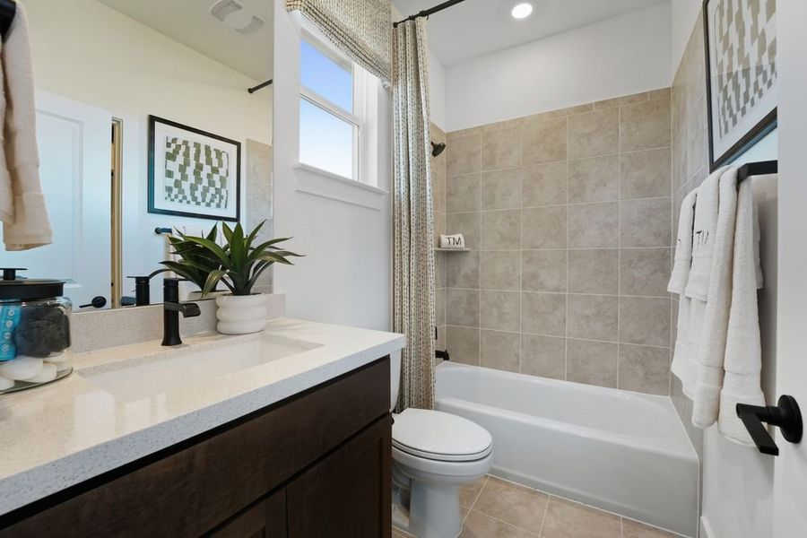 Furnished interior view inside a new home in Travisso, Leander (Image 24).