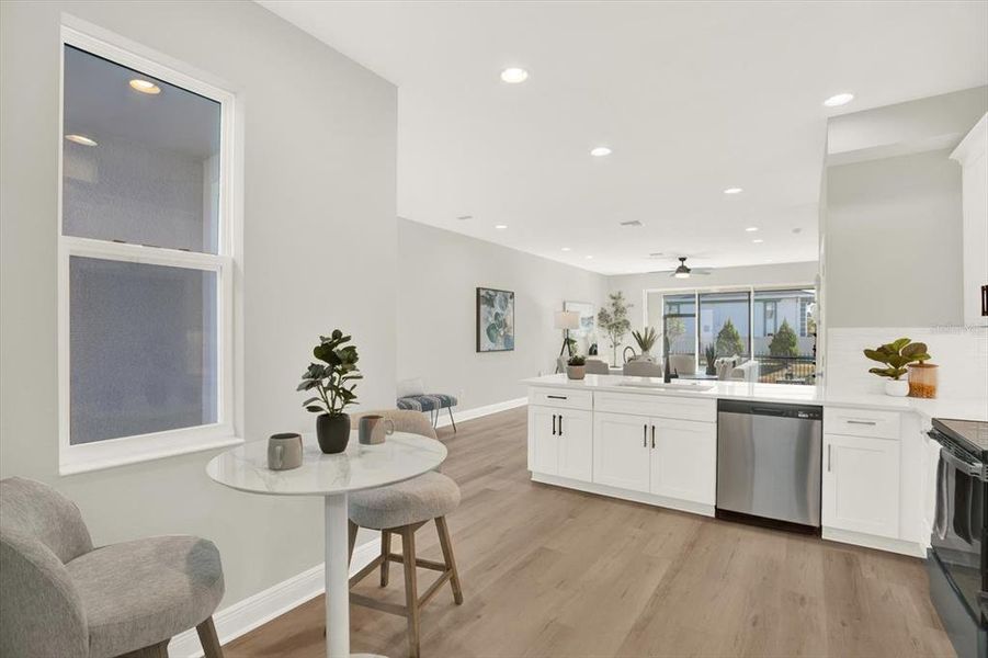 Furnished interior view inside a new home in The Towns At Long Bayou, Seminole (Image 16). Furnished interior view inside a new home in The Towns At Long Bayou, Seminole (Image 16).