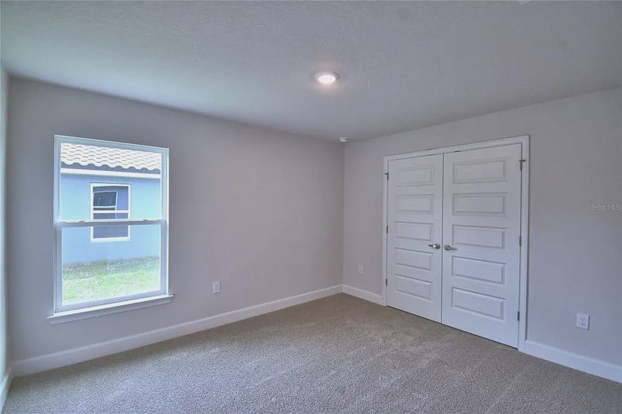 Spacious, unfurnished interior of a new home in Lake Juliana Estates, Auburndale (Image 34).