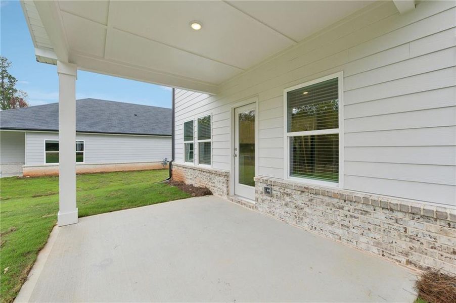 Exterior details and patio area of a home in Preserve at Mountain Creek, Pendergrass (Image 2).