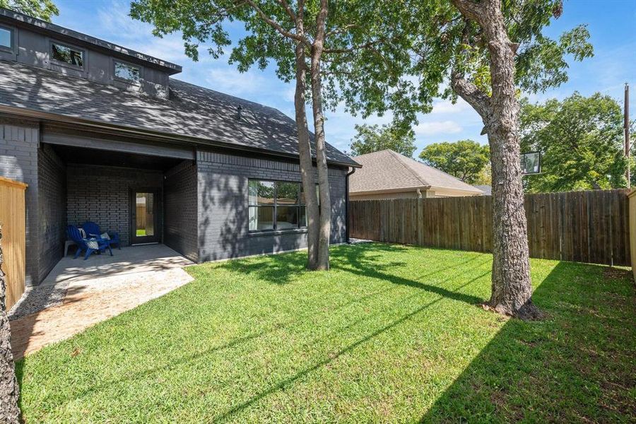 View of yard with a patio area View of yard with a patio area