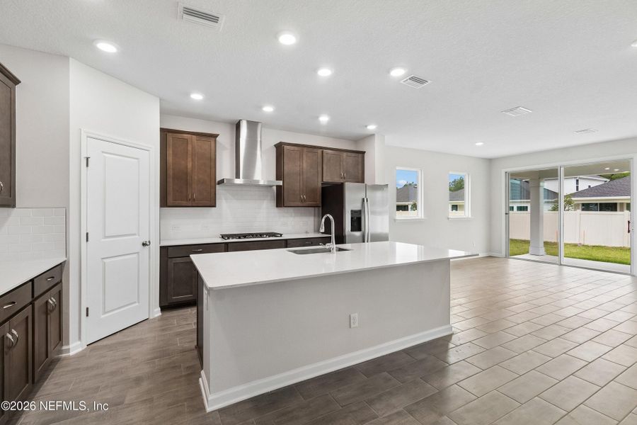 Furnished interior view inside a new home in Tributary 50', Yulee (Image 4).