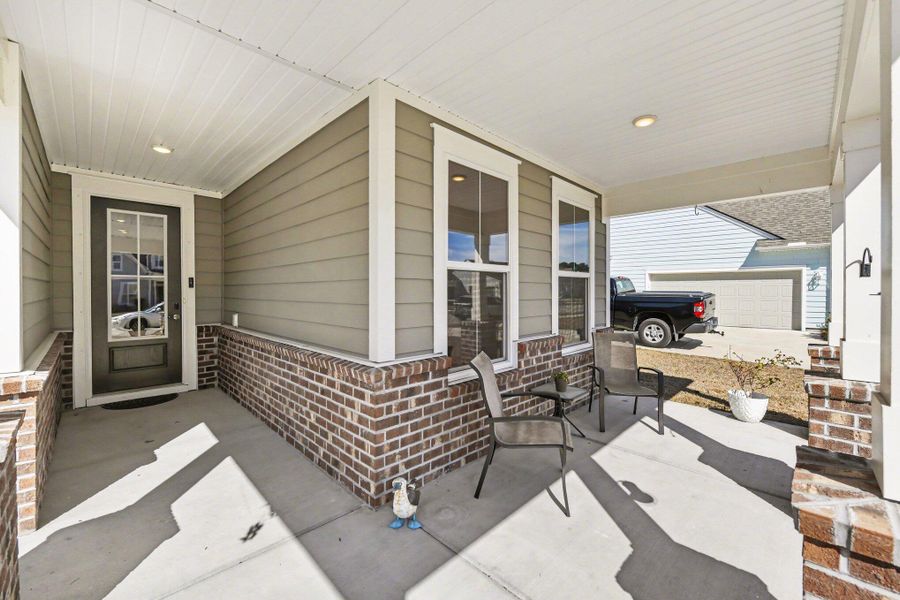 Exterior details and patio area of a home in , Johns Island (Image 24).