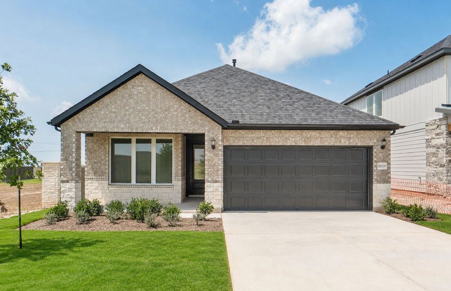 Front exterior of a new home in Kuempel Farms, Pflugerville, TX, highlighting curb appeal (Image 21).