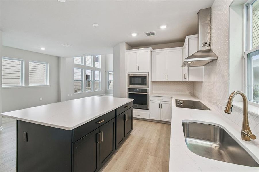 Furnished interior view inside a new home in Weslyn Park in Sunbridge 34', St. Cloud (Image 16).