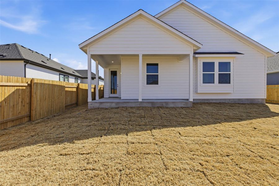 Exterior details and patio area of a home in Enclave at Cele, Pflugerville (Image 4).