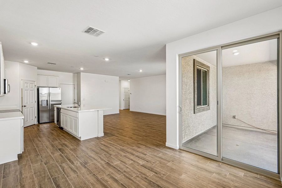 Dining into kitchen and great room Dining into kitchen and great room