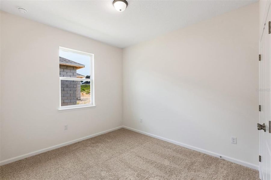 Spacious, unfurnished interior of a new home in Grand Isle, Grand Island (Image 8).