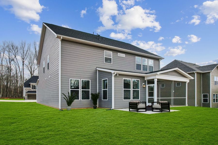Rear Exterior with Screened Porch and Patio