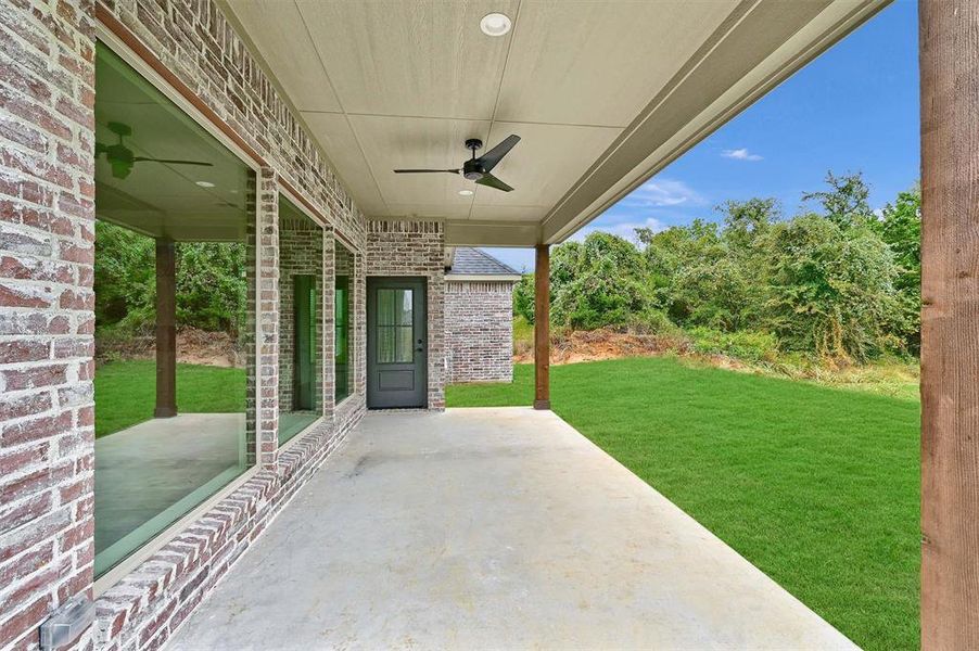 View of patio / terrace with ceiling fan