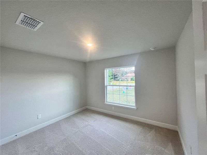 Spacious, unfurnished interior of a new home in Orange Blossom Hills, Summerfield (Image 9).