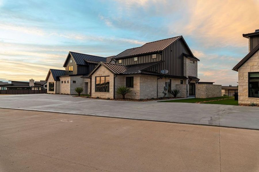 Front exterior of a new home in , Iredell, TX, highlighting curb appeal (Image 22). Front exterior of a new home in , Iredell, TX, highlighting curb appeal (Image 22).