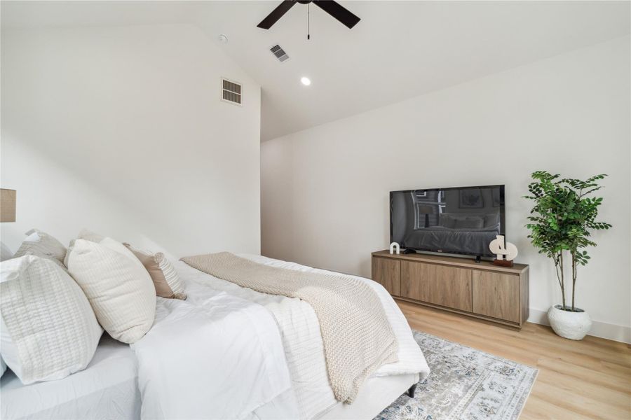 Whether it’s your morning coffee or your favorite show before bed, this serene primary suite invites you to unwind in total comfort.