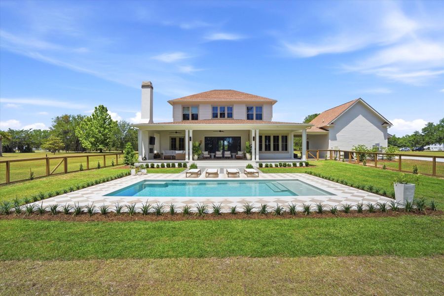 Exterior details and patio area of a home in , Wadmalaw Island (Image 31).