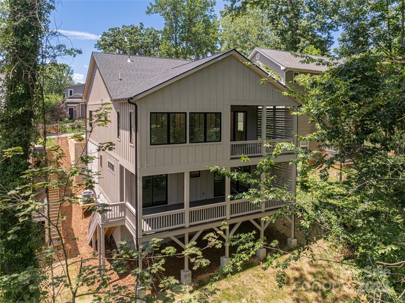 Front exterior of a new home in , Asheville, NC, highlighting curb appeal (Image 25). Front exterior of a new home in , Asheville, NC, highlighting curb appeal (Image 25).