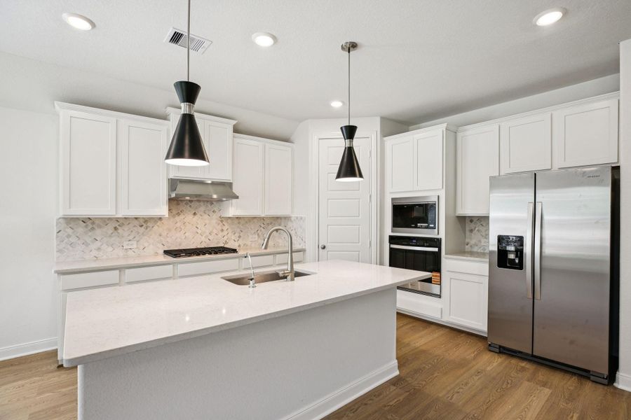 Photo is not of the actual home, but is an inspirational photo of builder’s model home and may depict options, furnishings, and/or decorator features that are not included