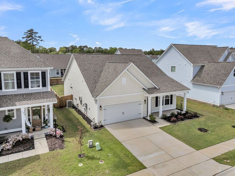 Front exterior of a new home in High Point at Foxbank, Moncks Corner, SC, highlighting curb appeal (Image 31).