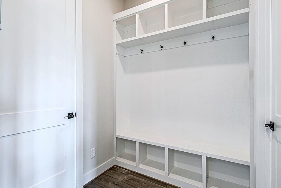 Convenient mudroom with built-in storage and organization space Convenient mudroom with built-in storage and organization space