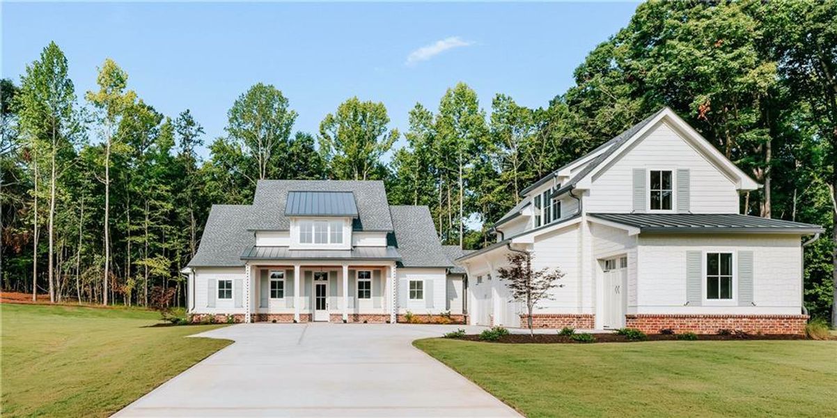 Front exterior of a new home in , Jefferson, GA, highlighting curb appeal (Image 34).