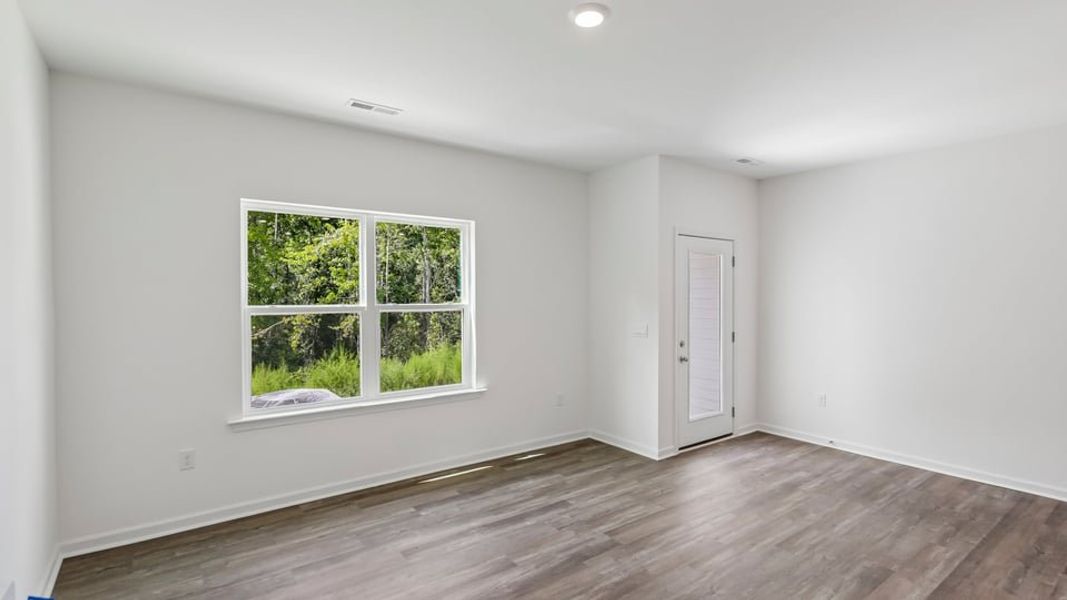 Spacious, unfurnished interior of a new home in The Townes at Belle Grove, Wendell (Image 8).