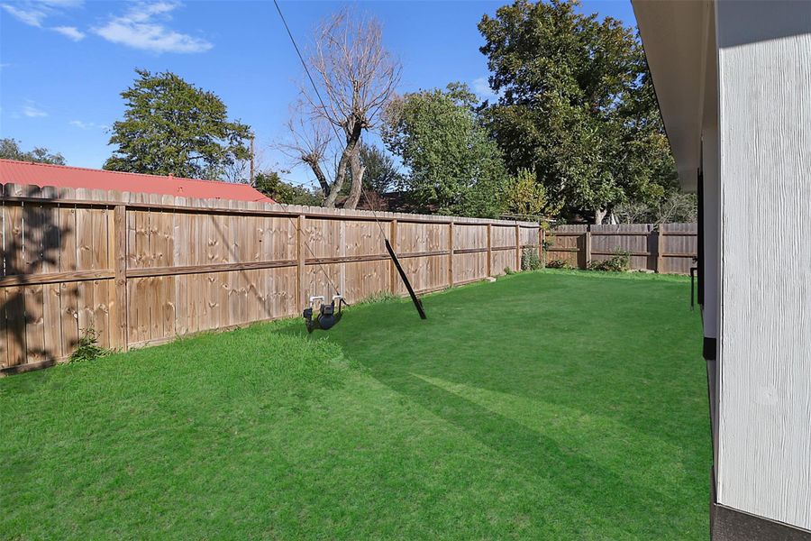 Exterior details and patio area of a home in , Baytown (Image 3).