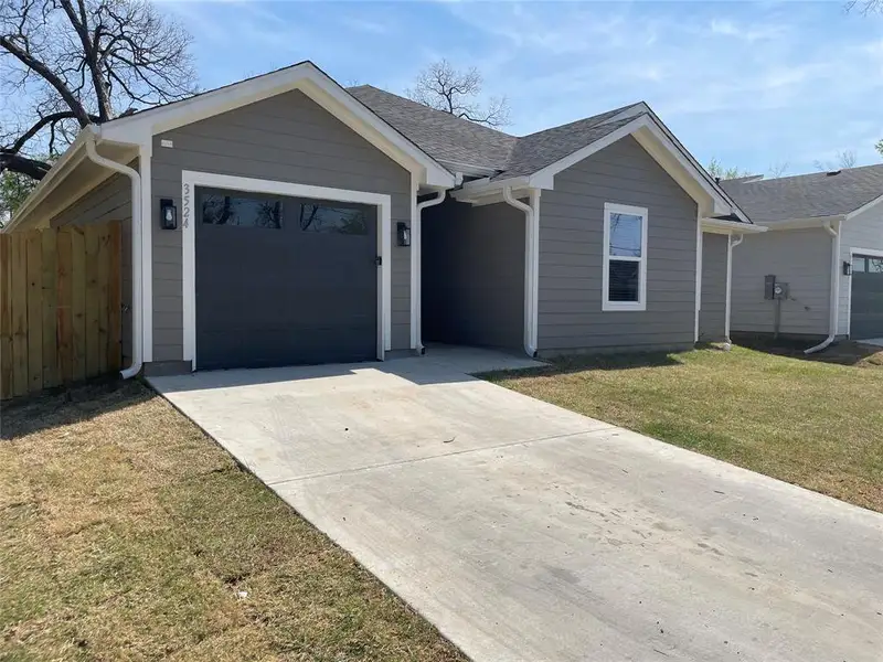 Front exterior of a new home in , Dallas, TX, highlighting curb appeal (Image 10). Front exterior of a new home in , Dallas, TX, highlighting curb appeal (Image 10).