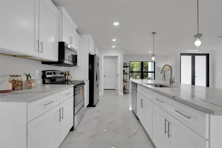 Furnished interior view inside a new home in , Lehigh Acres (Image 32).