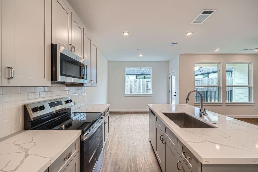 Furnished interior view inside a new home in Townhomes at Gattis, Round Rock (Image 14).