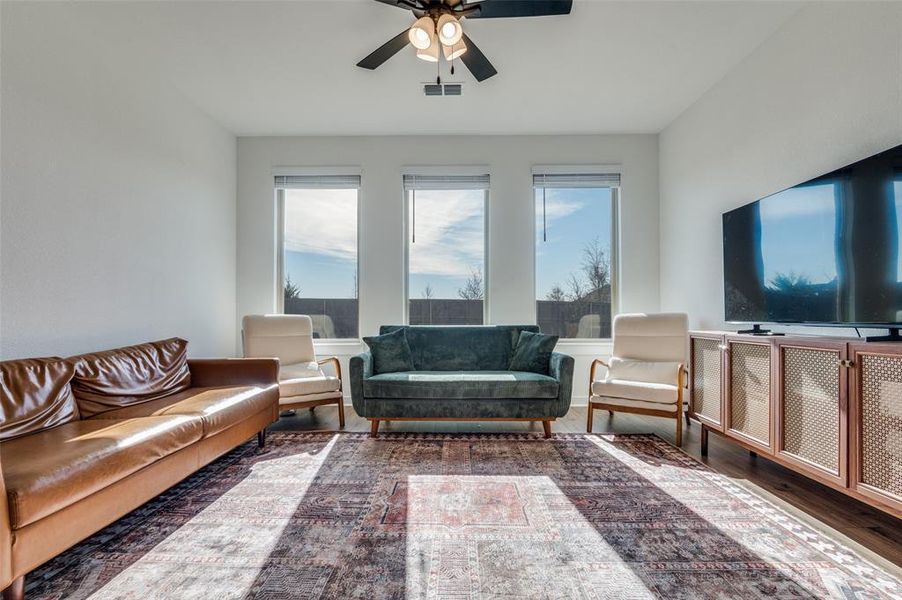 Furnished interior view inside a new home in Prairie Ridge at Goodland, Venus (Image 9).