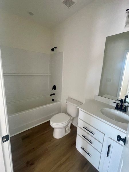 Furnished interior view inside a new home in Springwood Grove, Central (Image 8).