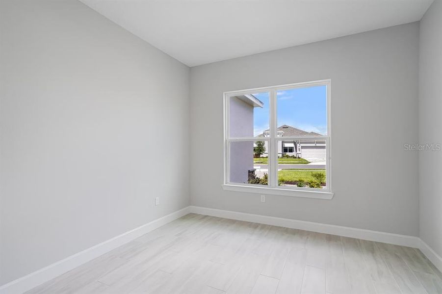 Spacious, unfurnished interior of a new home in Esplanade at Westview, Kissimmee (Image 22).