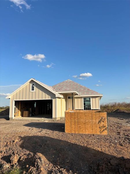 Front exterior of a new home in , Snook, TX, highlighting curb appeal (Image 16). Front exterior of a new home in , Snook, TX, highlighting curb appeal (Image 16).