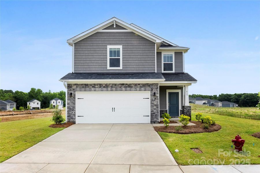 Front exterior of a new home in Seattle Crossing, Shelby, NC, highlighting curb appeal (Image 16).