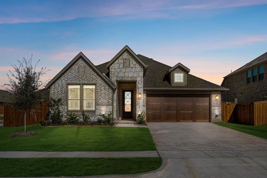 Front exterior of a new home in Sonoma Verde, McLendon-Chisholm, TX, highlighting curb appeal (Image 21).