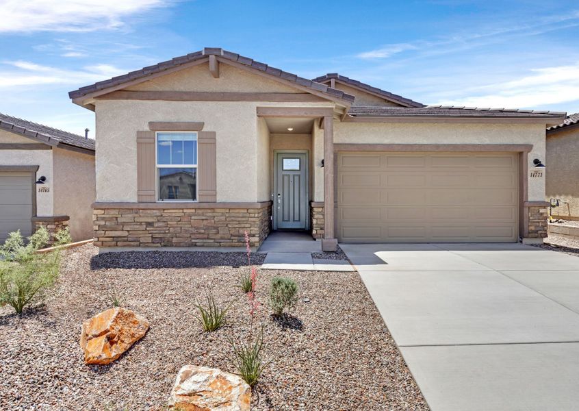 Front exterior of a new home in Saguaro Reserve II, Marana, AZ, highlighting curb appeal (Image 1). Front exterior of a new home in Saguaro Reserve II, Marana, AZ, highlighting curb appeal (Image 1).