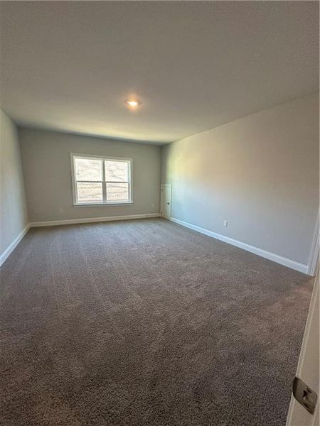 Spacious, unfurnished interior of a new home in Mirror Lake at South Harbour, Villa Rica (Image 39).