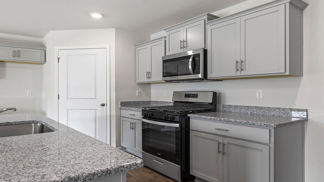 Furnished interior view inside a new home in Bentley Park, Greenwood (Image 10).