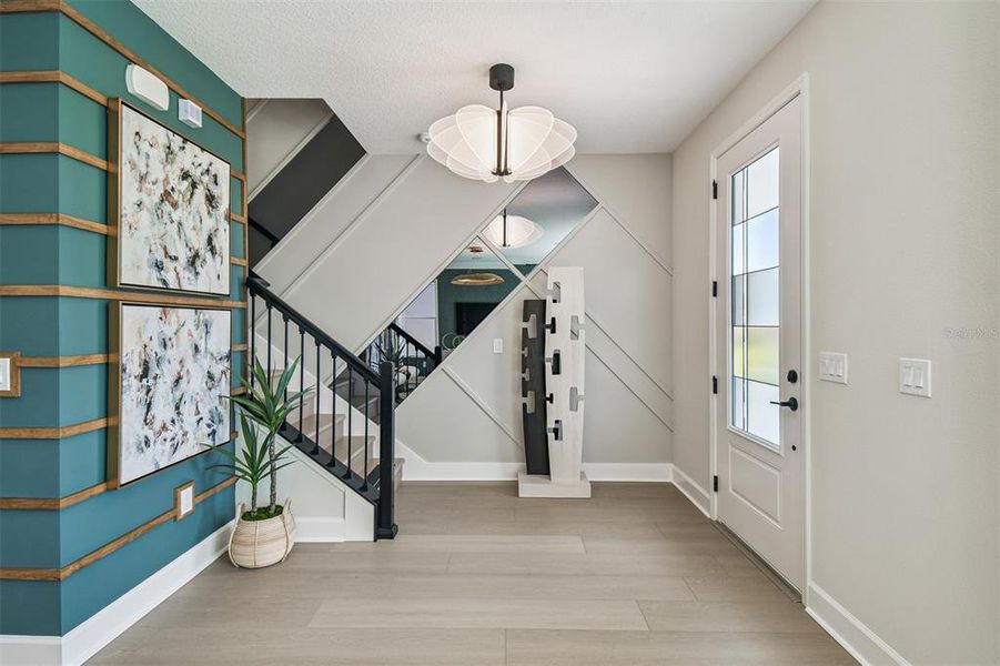 Furnished interior view inside a new home in Lake Star at Ovation, Winter Garden (Image 11).