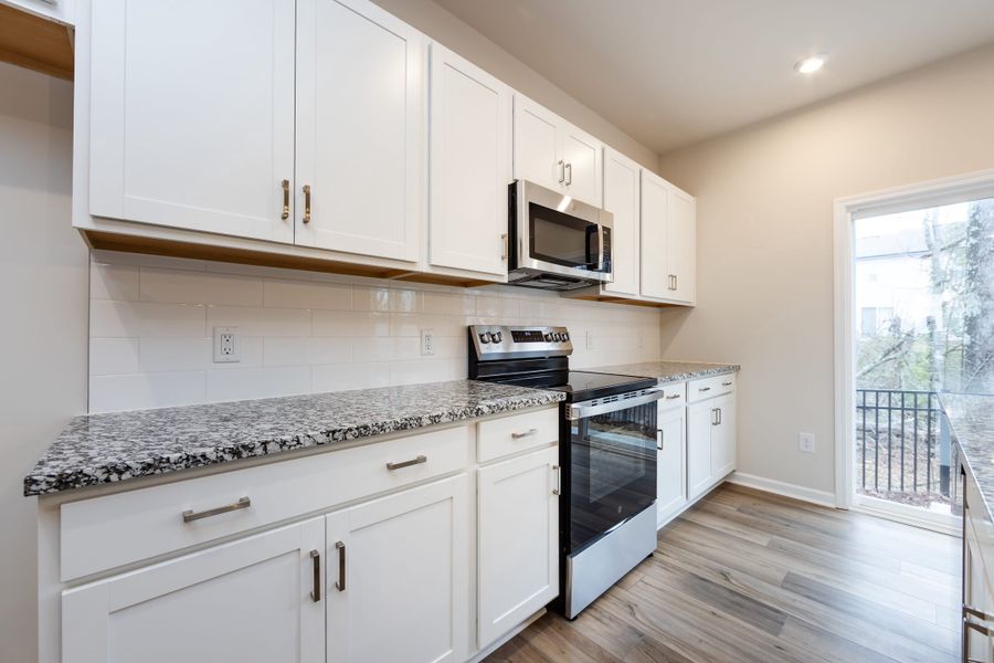 Furnished interior view inside a new home in Fifteen 15 Cannon, Charlotte (Image 8).