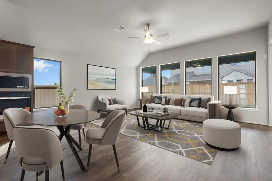 Furnished interior view inside a new home in Dunham Pointe 50', Cypress (Image 9).